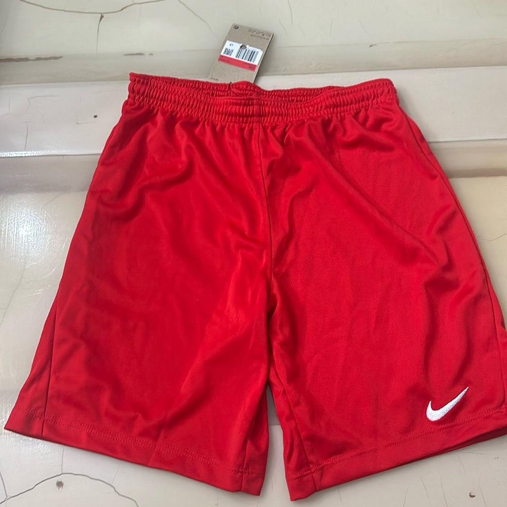 Kids large red Nike shorts
